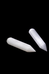 Closeup shot of Raw Tower of Selenite Crystal on black background