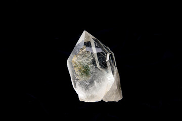 Closeup shot of a piece of beautiful Himalayan Clear Quartz Crystal on black background