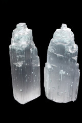 Closeup shot of Raw Tower of Selenite Crystal on black background