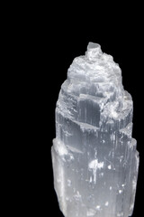 Closeup shot of Raw Tower of Selenite Crystal on black background