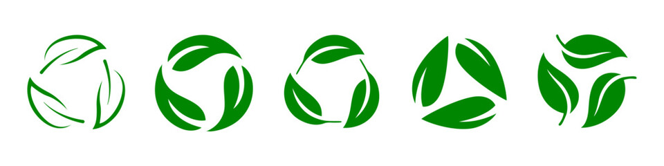 Leaf recycling symbol icon set. Biodegradable leaf recycling symbol set in green color. Recycling, reusing symbol in green color isolated on white background. - obrazy, fototapety, plakaty