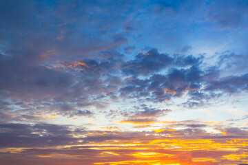 Naklejka na ściany i meble Morning clouds and sky,Real majestic sunrise sundown sky background with gentle colorful clouds without birds. Panoramic, big size