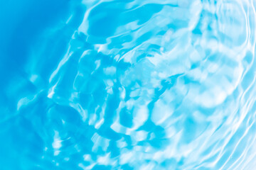 Blue water surface,Transparent blue clear water surface texture with ripples, splashes and bubbles....