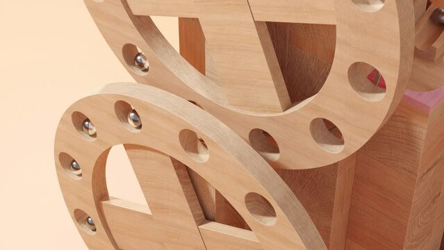 Wooden Marble Run Machine with warm lighting and plain empty background. Vintage wooden Rolling Ball Sculpture.