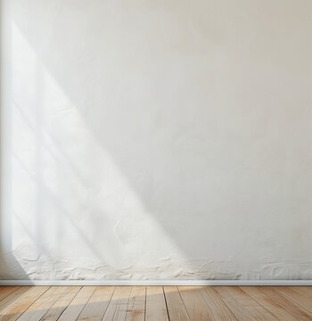 Mock-up, mur vierge en ciment blanc gris avec l'&eacute;clairage d'une fen&ecirc;tre en diagonale, parquet en bois ch&ecirc;ne clair. Tons clairs neutres