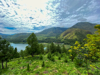 Fototapeta premium Cloudy Sky Against The Lake. Lake Toba taken from Sibea-bea hills, North Sumatra.