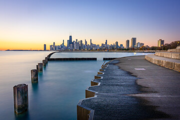 Chicago skyline viewed from the North at dawn with Lake Michigan