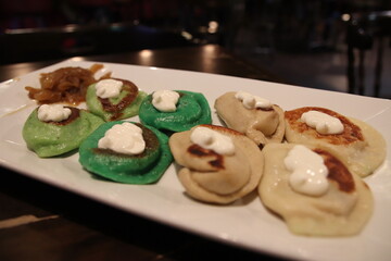 Pierogis on a plate at a restaurant in Columbus, Ohio.  