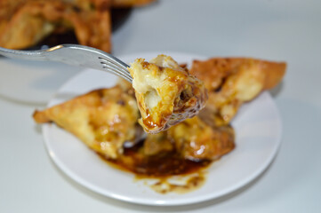 Batagor siomay Bandung, is a street food that is very popular in Indonesia, is one of the local foods. Served with spicy peanut sauce.