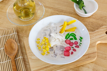 Mix coconut milk dessert. Thai iced dessert (Ruam Mit), one of the most popular Thai desserts in the summer season, mixes a variety of rice noodles, sweet corn