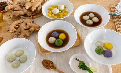Stuffed Glutinous Rice Balls with Sesame in Sweet Ginger Soup