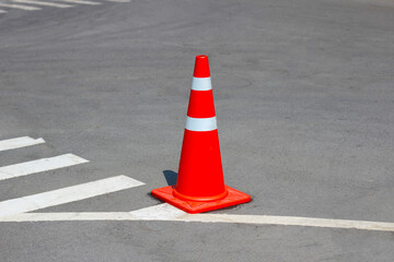 Street with orange traffic cone