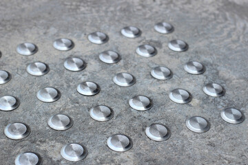 Cement fllor with tactile ground surface indicators