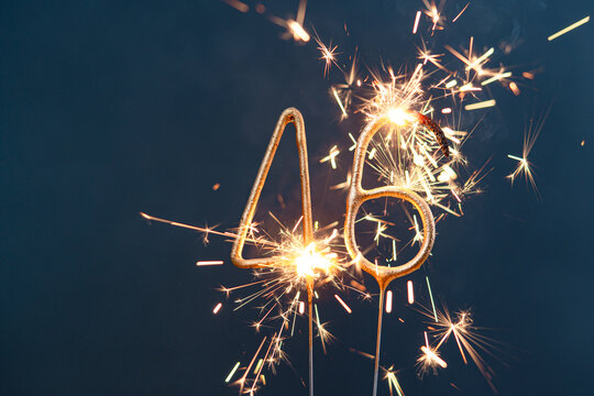 46 years celebration festive background made with Bengal fires in the form of number Forty-six.