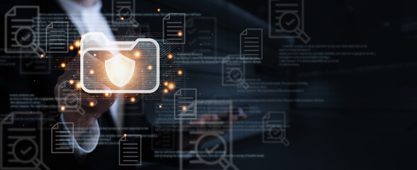 Business man holding and managed his cybersecurity and privacy to protect data by lock icon holographic technology.protecting personal data on laptops and virtual interfaces prevent mail from scammer