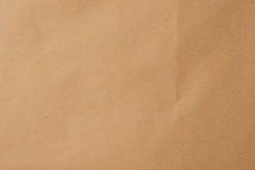 Brown paper background. Beige cardboard texture. Wallpaper. Dark beige wrapping paper background