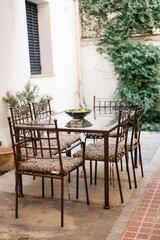 table and chairs in the garden on European terrace