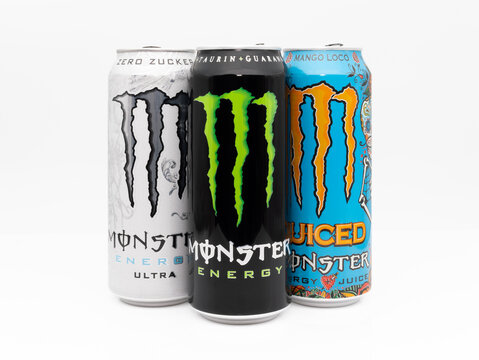 DRESDEN, GERMANY - 29. December 2023: Monster energy most popular flavors. The Original energy drink, Ultra White and Mango Loco together. Sweet and fruity lifestyle beverages isolated on white.