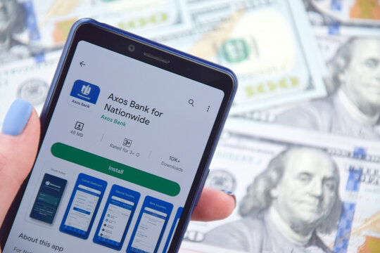 Axos mobile banking app on smartphone screen.