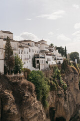 white village buildings on a cliffside in Ronda Spain