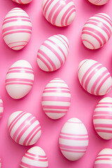 Fototapeta na wymiar Pink and White Striped Easter Eggs on Pink Background