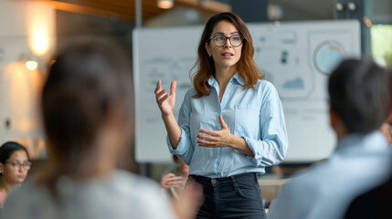 Professional woman giving a presentation with various charts and graphs in the background