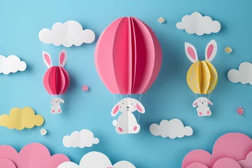 Crédence de cuisine en verre imprimé Montgolfière Bunny with hot air balloons in the sky. Paper art background for Easter Day.