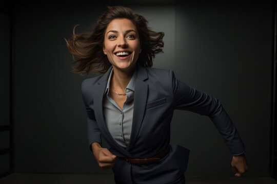 businesswoman running on dark banground