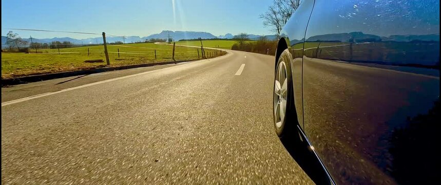 Anamorphic car POV: Bavarian Country road in early spring