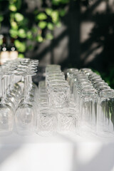 glasses set up on a table for wedding reception