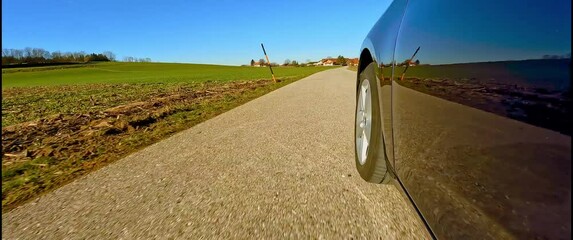 Anamorphic car POV: Bavarian Country road in early spring