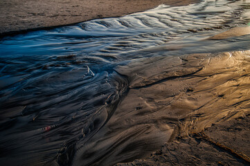 sand  patterns and water