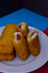 Risoles or risol mayo, stuffed with smoked meat  with mayonaise, on a  white plate.