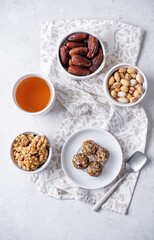 Dates and nuts raw healthy balls in a plate