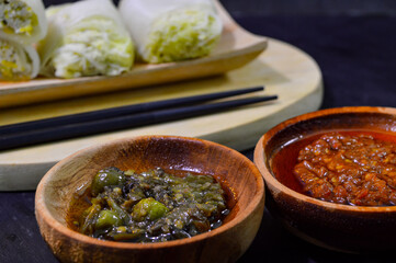 Sawi gulung tahu or rolled Chinese cabbage with tofu. Served with red chilli sauce and green chilli sauce.