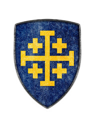 Old metal crusaders shield with cross isolated on white background