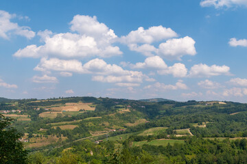 Panorama of the Langhe hills, Unesco World Heritage Site, in summer, Cuneo province, Piedmont, Italy