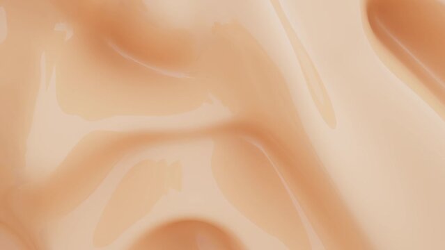 Abstract peach looping animation background. Smooth beige wavy plastic or latex. Acrylic liquid.