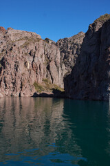 Fototapeta na wymiar View of mountains and crystal blue lake
