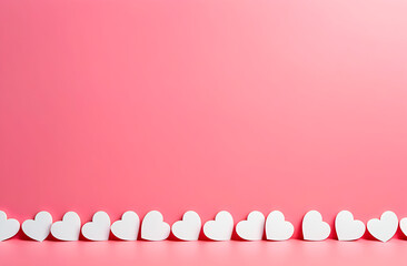 Light pink background with white little hearts in a row, backdrop with copy space