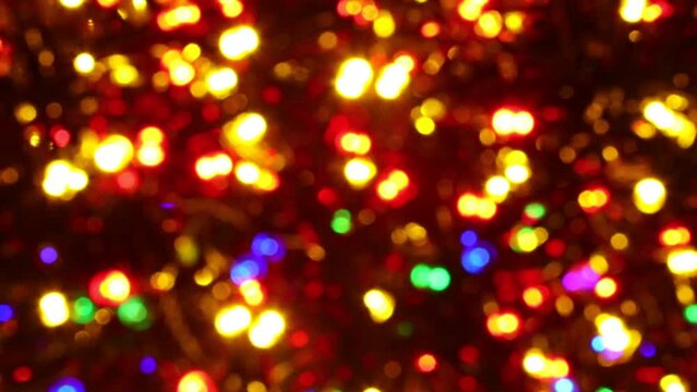 intentionally blurred background of flashing LED lights lighting up during holidays