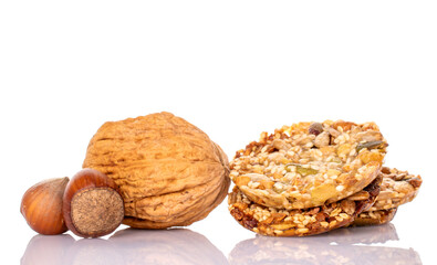 Several sweet Thaler cookies with nuts, macro, isolated on white background.	
