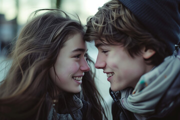 Young teen couple on their first date. Teenage boy and teenage girl celebrating Valentine's Day. Boyfriend and girlfriend spending time together outdoors. First love concept.