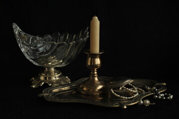 antique candlestick with a candle