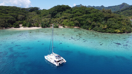 Cruise boats in Auea Bay, Huahine, Leeward Islands, French Polynesia