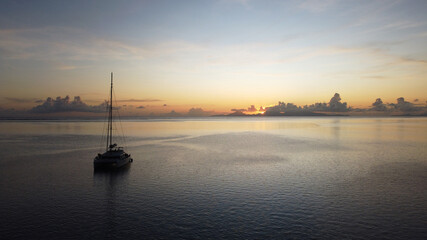Cruise boats in Auea Bay, Huahine, Leeward Islands, French Polynesia