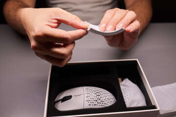 white new wireless computer mouse flat lay with led lights
