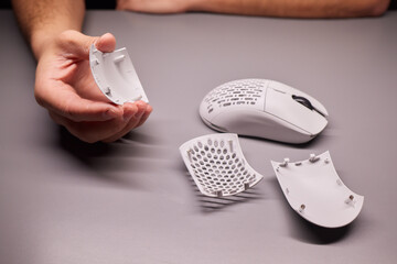 white new wireless computer mouse flat lay with led lights
