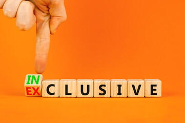 Inclusive or exclusive symbol. Concept word Exclusive and Inclusive on wooden cubes. Businessman hand. Beautiful orange table orange background, copy space. Business inclusive or exclusive concept.