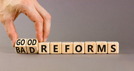 Good or bad reforms symbol. Concept words Good reforms Bad reforms on beautiful wooden blocks....